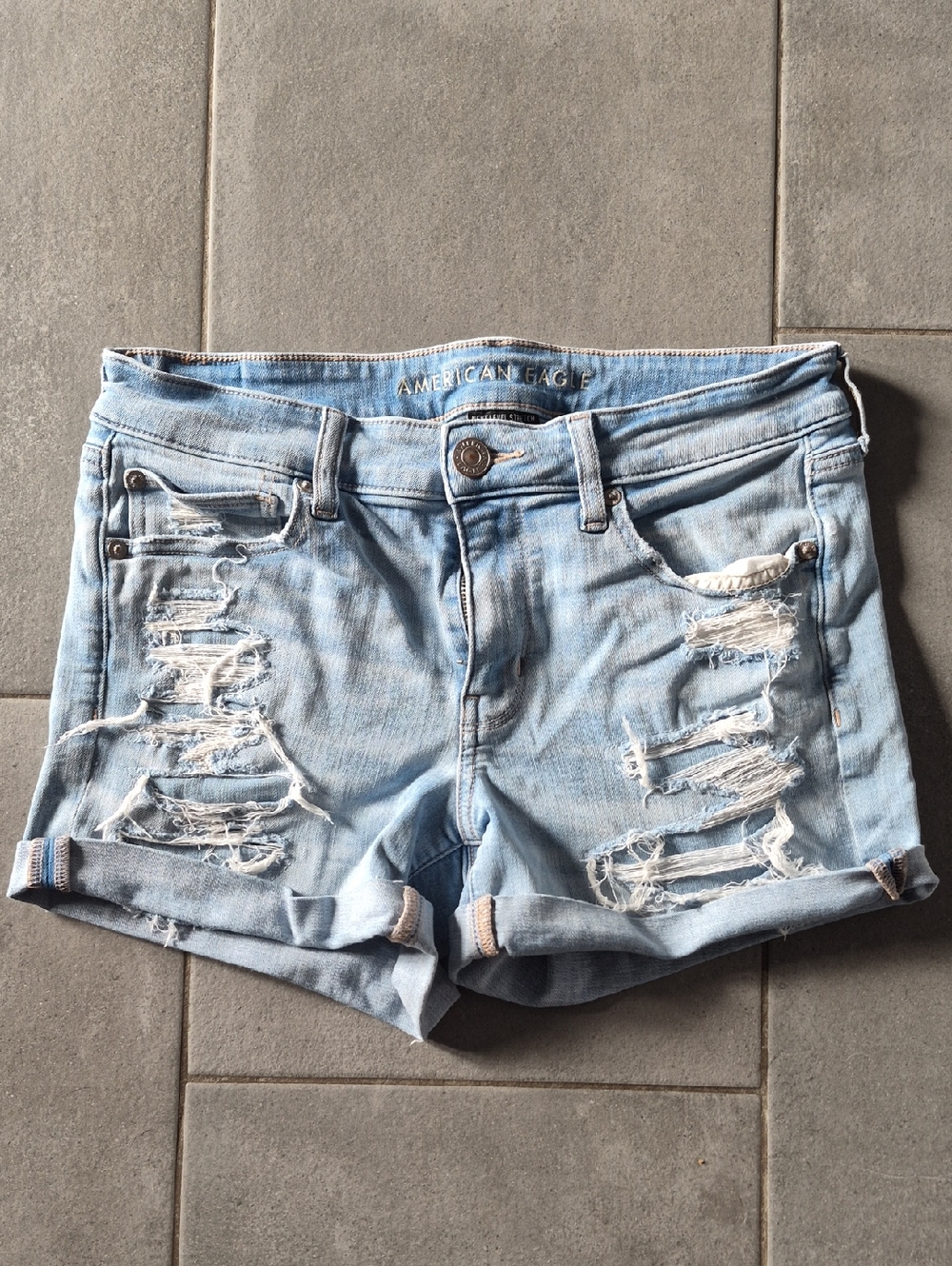 American Eagle Outfitters Light Blue Ripped Denim Jean Shorts.